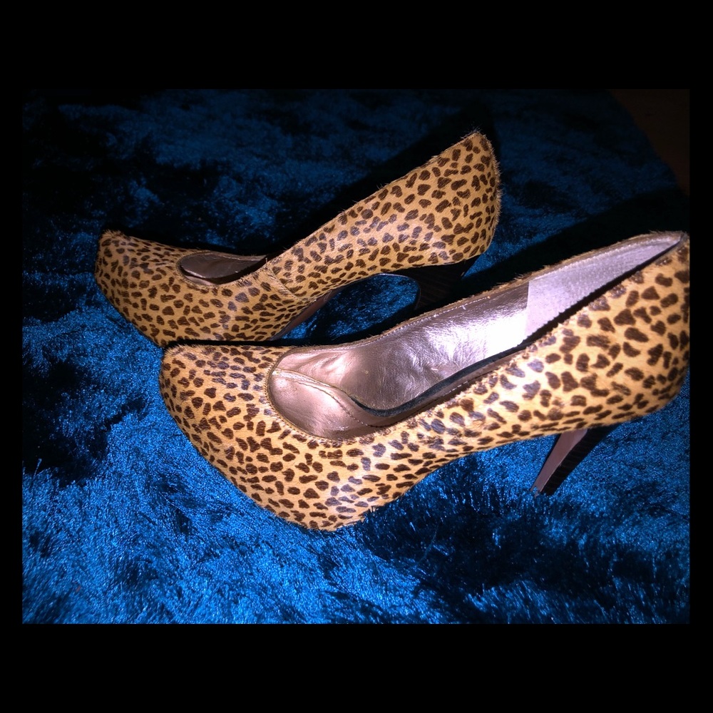 Cheetah print platform pumps